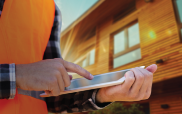 Inspector completing a healthy homes standards inspection